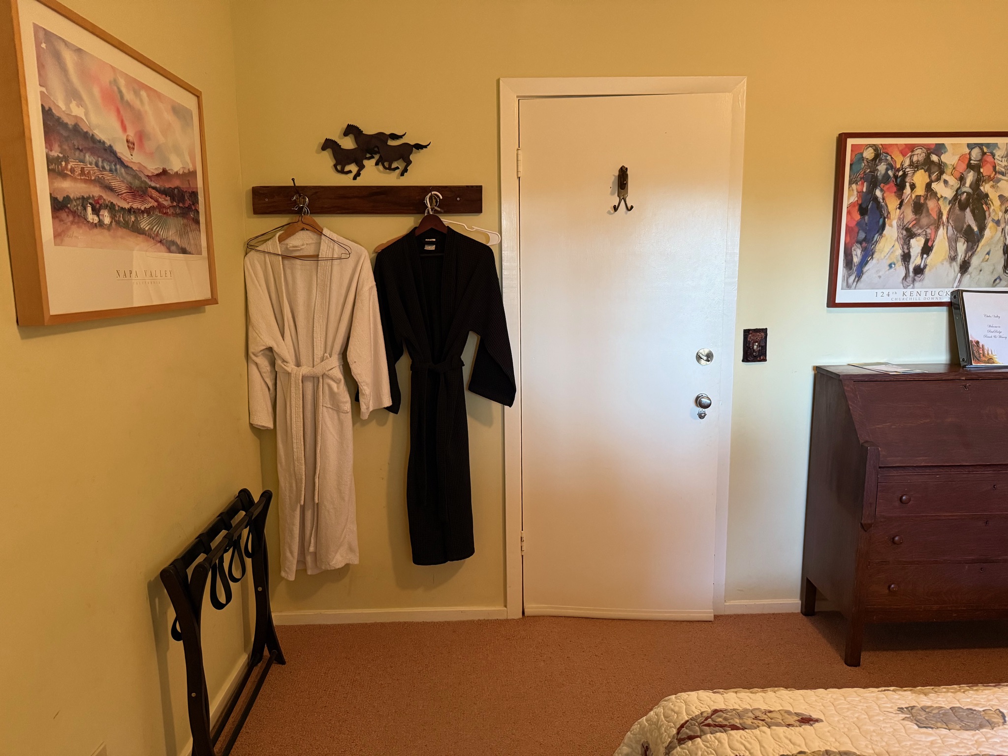 Looking at the door to enter the room
