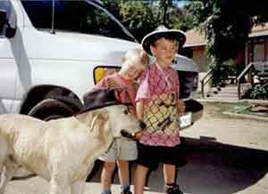 Bo with some children at the ranch